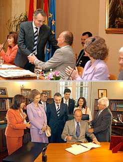Arriba, imagen de la mesa presidencial. Abajo, Don Juan Carlos firma en el Libro de Honor de la Junta de Bardenas